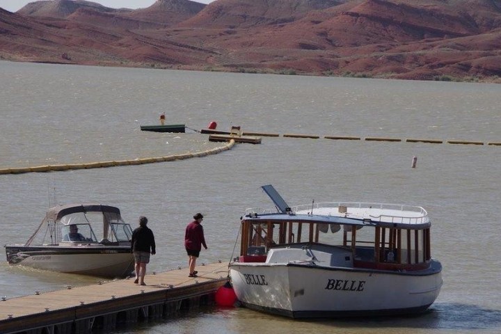 a small boat in a body of water